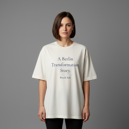A Berlin Transformation Story. Premium Oversized Unisex T-Shirt. - A shirt about the in-between.