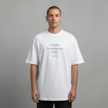 A Berlin Transformation Story. Premium Oversized Unisex T-Shirt. - A shirt about the in-between.