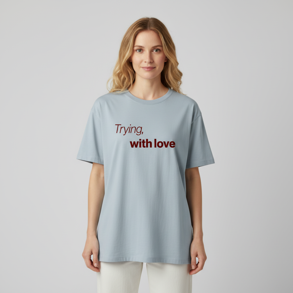 Trying, with love. Premium Oversized Unisex T-Shirt. - Love’s the effort. Not the reward.