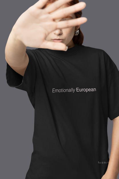 Emotionally European.  Premium Oversized Unisex T-Shirt.- Fluent in espresso, melancholy, and detachment.