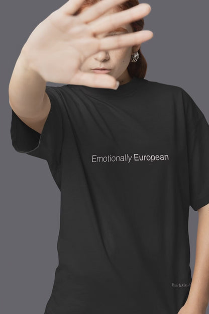 Emotionally European.  Premium Oversized Unisex T-Shirt.- Fluent in espresso, melancholy, and detachment.