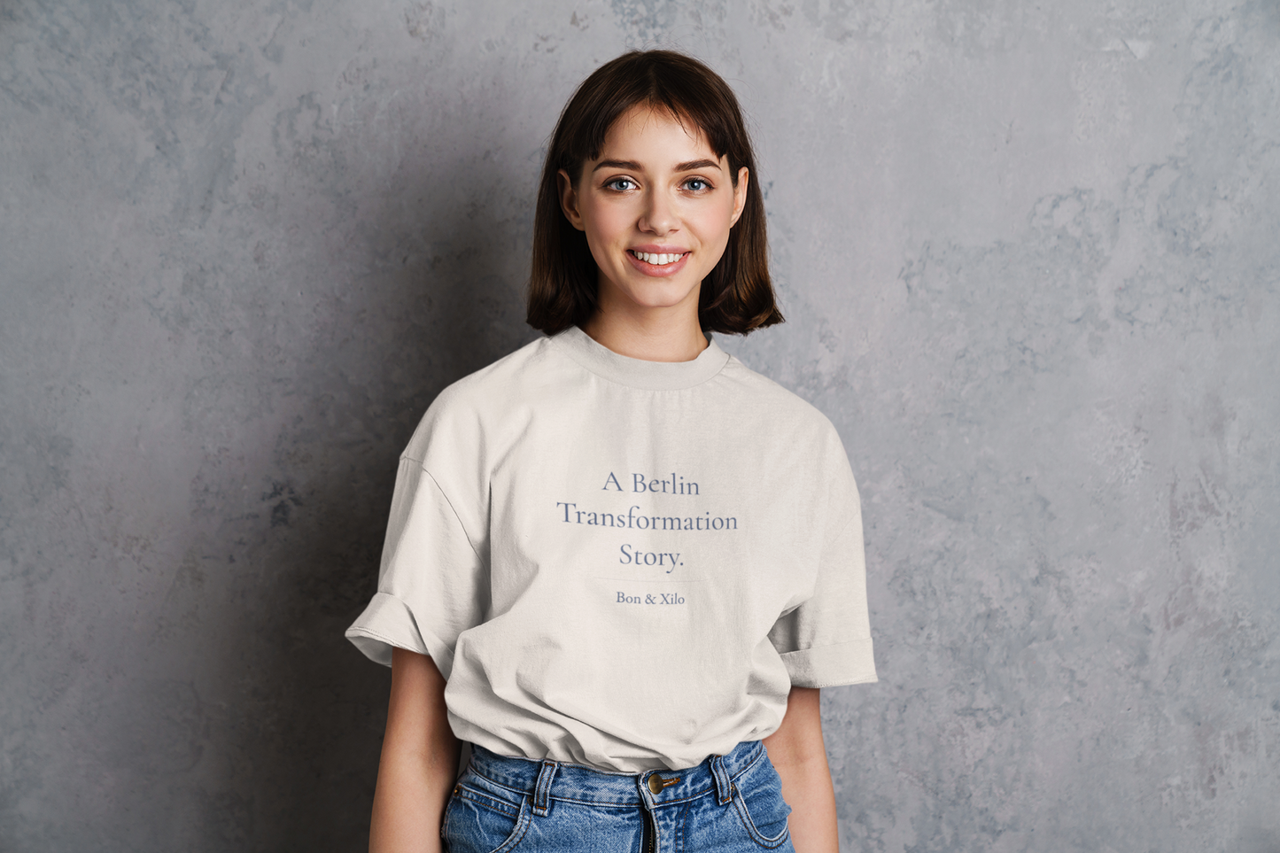 A Berlin Transformation Story. Premium Oversized Unisex T-Shirt. - A shirt about the in-between.